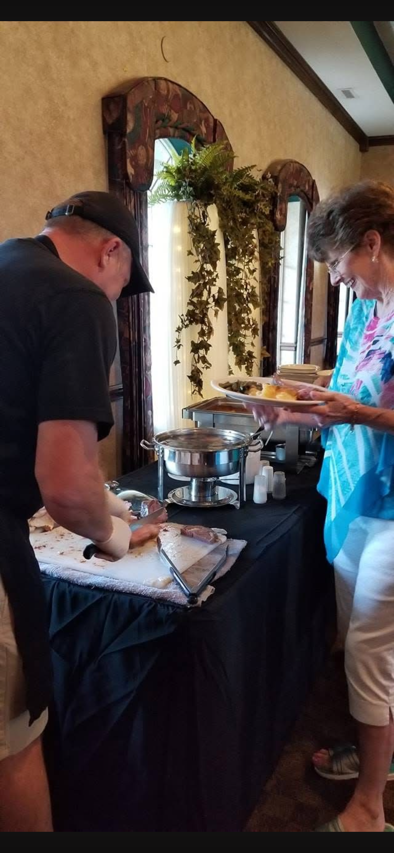 Fresh prime rib carved and served at a Coachman catered event